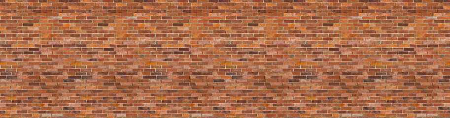 Obraz premium Red Brown Brick Wall background texture seamless pattern. Wide Panorama of masonry building brickwork