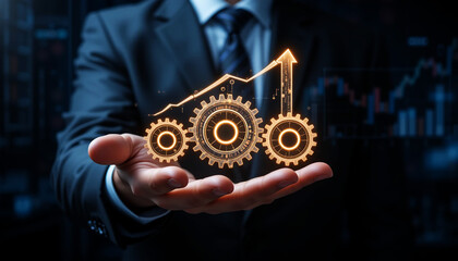 A business professional holding a glowing digital interface, featuring three illuminated gears