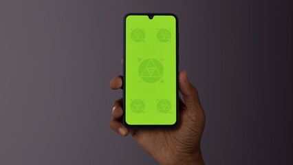 Black African-American old male using smartphone with a blank green screen. Mobile app video mockup. Vertical phone orientation