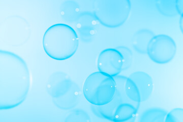 Beautiful Blue Soap Bubbles Floating in The Air. Celebration Festive Backdrop. Freshness Soap Suds Bubbles Water. Blue and White Gradient Textured .Abstract Background.	
