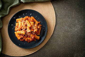 Rigatoni pasta bolognese with cheese