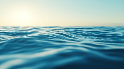 The clear blue ocean water with a sunlit horizon in view