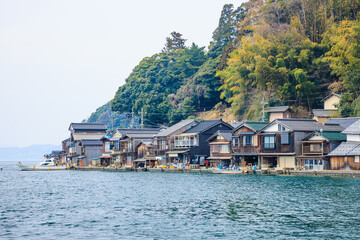 Naklejka premium 春の伊根の舟屋 京都府伊根町 Spring Funaya in Ine. Kyoto Pref, Ine town.