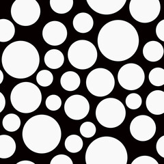 Black and white design Simple abstract geometric seamless background White small and large chaotic circles, polka dots on black background Minimalist style