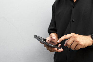 Man Using Smartphone for Communication and Digital Interaction
