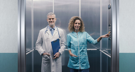 Doctor and nurse in the hospital elevator © stokkete