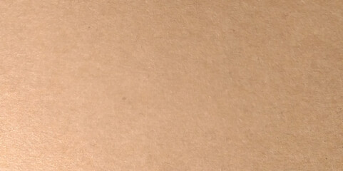 Abstract brown recycled paper background.
Old Kraft paper texture box craft stripes pattern.
top view. Close up brown paper texture and background with copy space