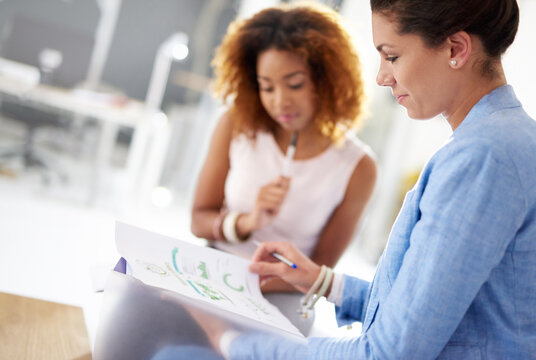 Colleagues, paperwork and woman with graphs for planning, strategy and discussion in office. Financial, teamwork or investment advisor with document, professional and female person with budget review - Powered by Adobe