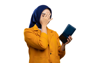 Sad young Asian woman looking at empty wallet, covering face with her hands, no money isolated on transparent background