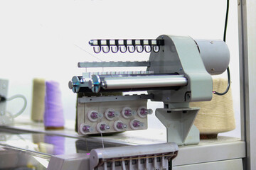 The image of a machine for embroidery on a white background