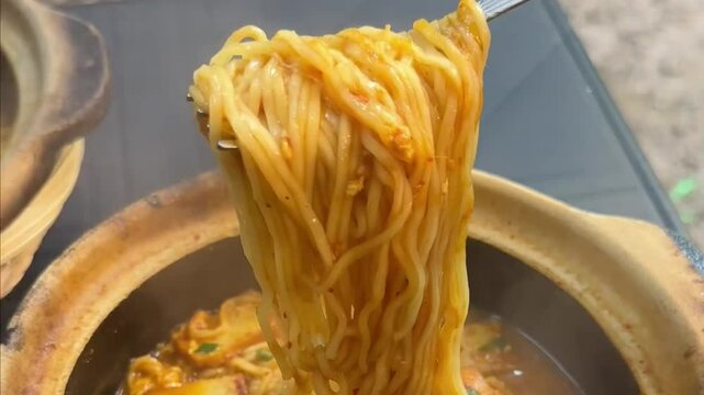 Claypot Maggi Curry Mee with Egg and Turmeric Flavor