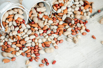 Assorted nuts for a background Almond, walnut,cashew, pistachios, hazelnuts, peanuts, Macadamia...