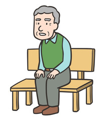 ベンチに座り休んでいる高齢者の男性