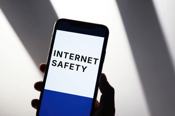 Internet Safety text message inscription on the smartphone screen