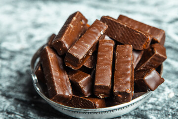 Assortment of sweet confectionery with chocolate candies and pralines. Children's holiday table with chocolate sweets