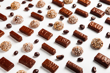 Assortment of sweet confectionery with chocolate candies and pralines. Children's holiday table with chocolate sweets