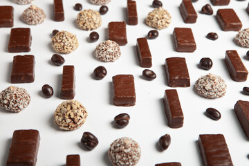 Assortment of sweet confectionery with chocolate candies and pralines. Children's holiday table with chocolate sweets