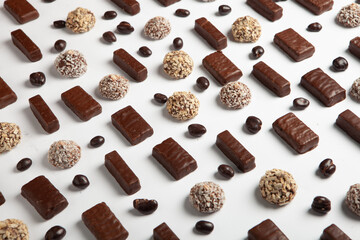 Assortment of sweet confectionery with chocolate candies and pralines. Children's holiday table with chocolate sweets