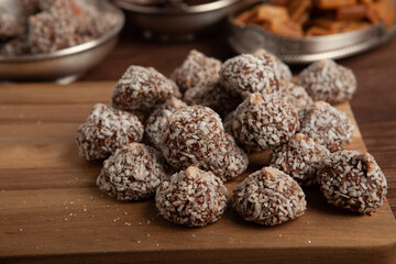 Assortment of sweet confectionery with chocolate candies and pralines. Children's holiday table with chocolate sweets