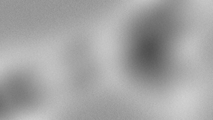 Luxurious and elegant abstract grey background with smooth gradient and speckled texture.