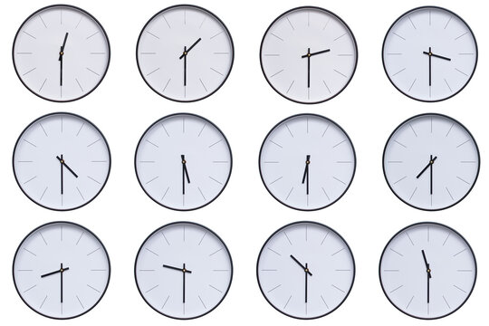 A set of 12 wall clocks with black frames and clean white faces, displaying a different time interval from 00:30 to 11:30 or 12:30 to 23:30. The modern and clean design makes this set ideal for themes