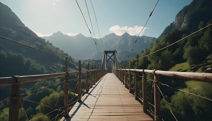 Obraz premium Wooden Suspension Bridge in Mountain Valley