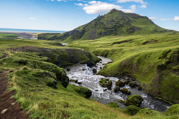 Beautiful view of Skoga river and canyon looking at the ocean, Iceland, Europe