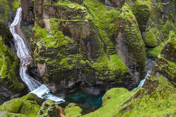 Beautiful M&ouml;g&aacute;foss waterfall in Fja&eth;r&aacute;rglj&uacute;fur canyon in Iceland, V&iacute;k &iacute; M&yacute;rdal, Europe, Icelandic nature,  Icelandic landscape