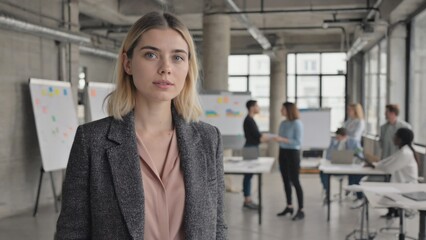 Obraz premium Office worker, corporate attire, modern workspace, professional look, business environment
