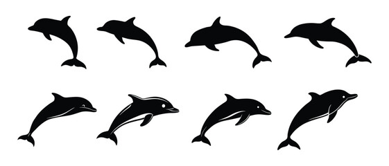 Obraz premium Dolphin silhouettes vector set.