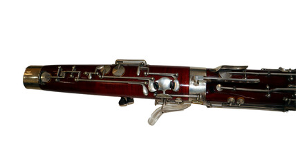 Close-up view of a bassoon showcasing its wooden craftsmanship and metal keys, ideal for musical education and instrument analysis, emphasizing its rich tones in performances.