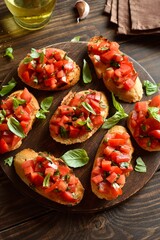 Delicious bruschetta with with cherry tomatoes and basil