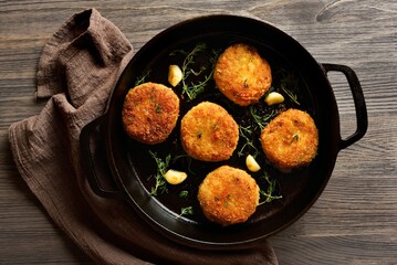 Fish cakes from mashed potato and minced cod fish