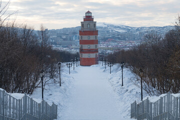 A lighthouse chapel in memory of sailors who died in peacetime against the backdrop of a city...