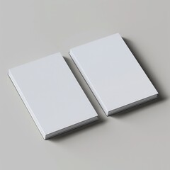 mockup of Two blank notebooks with minimalistic design, placed on a neutral background, perfect for jotting down ideas or sketches.