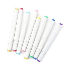 Many double-sided marker pens on white background, top view