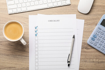 Checklist with marked checkboxes, stationery, coffee, computer keyboard and mouse on wooden table, flat lay