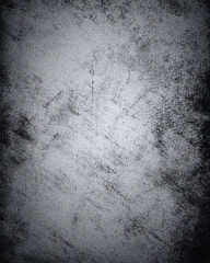 Obraz premium Black and gray grunge texture with visible scratches and scuffs, enhanced by a heavy vignette effect. Perfect for high contrast portrait, product photography, or wallpaper backdrops.