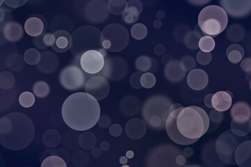 Blurred Circular Light Effects on Dark Purple Background