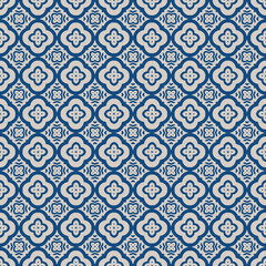 Traditional blue tile seamless pattern with floral shapes. background. Symmetrical rich navy blue backdrop in eastern style for ceramics, textiles, wallpapers, silk. Detailed oriental print.