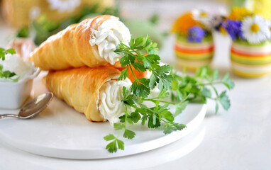 Stuffed crescent roll carrots on white background. Selective focus.