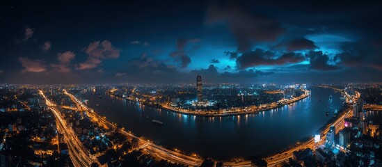 Fototapeta premium Night city river panorama, highway, clouds