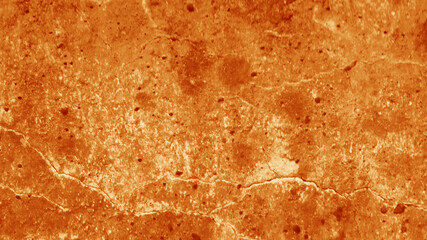 Old grunge orange wall texture background.