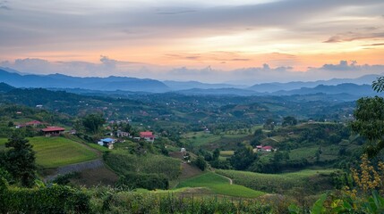 Obraz premium A scenic landscape of rolling hills and vibrant sunset hues