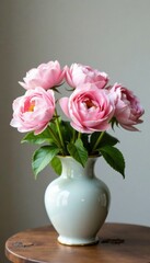 Pastel pink flowers in a vintage-inspired vase, elegant atmosphere, vintage floral arrangement, feminine style
