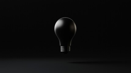 A black lightbulb with a white base.