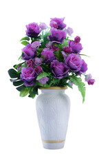 Stunning arrangement of lush purple hued flowers in a decorative vase creating a beautiful and elegant centerpiece