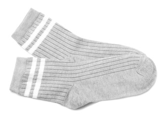 Pair of grey socks isolated on white, top view
