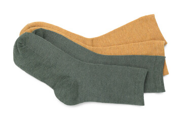 Pairs of stylish socks isolated on white, top view