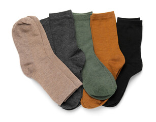 Many different pairs of socks isolated on white, top view